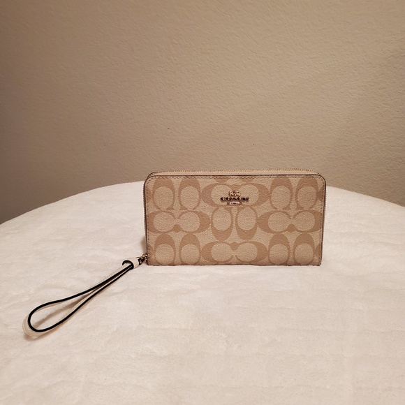 Coach Handbags - COACH LARGE PHONE WALLET IN SIGNATURE CANVAS